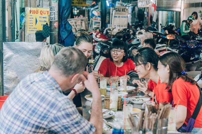 12 Tasting Street Food & Sightseeing By Scooter with Student - What the $30 price really covers