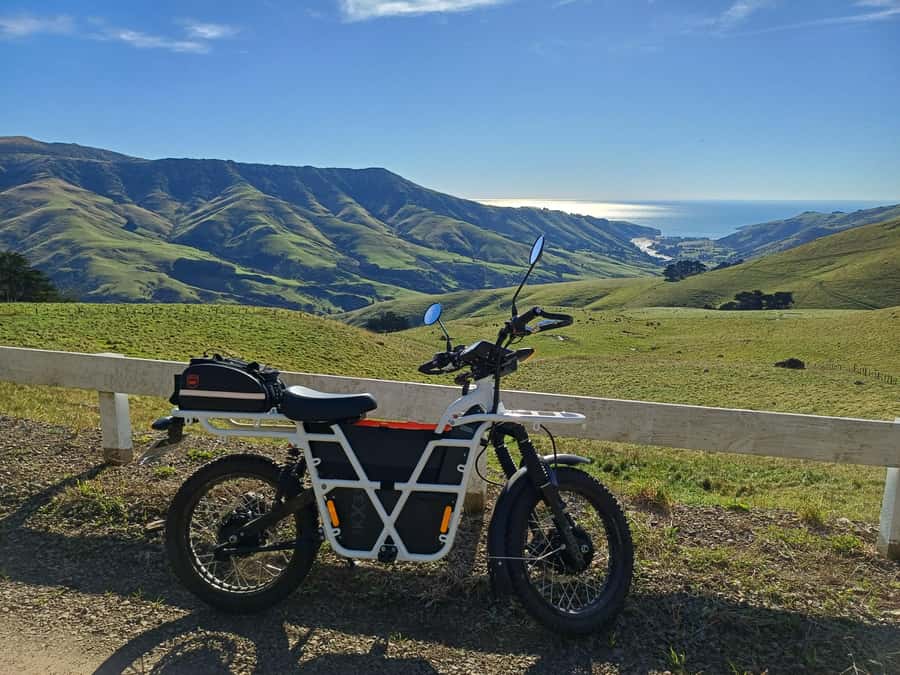 Akaroa: Lonely Beach Trail by E-Scooter. selfguided day out - Three beaches and the Pacific swim
