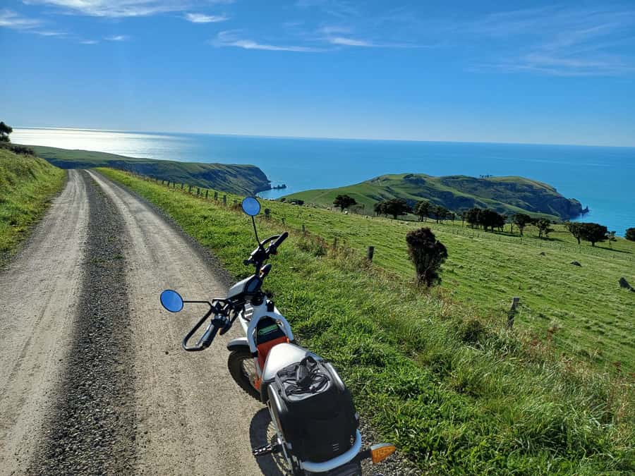 Akaroa: Lonely Beach Trail by E-Scooter. selfguided day out - Takamatua Valley Wines and the final stops