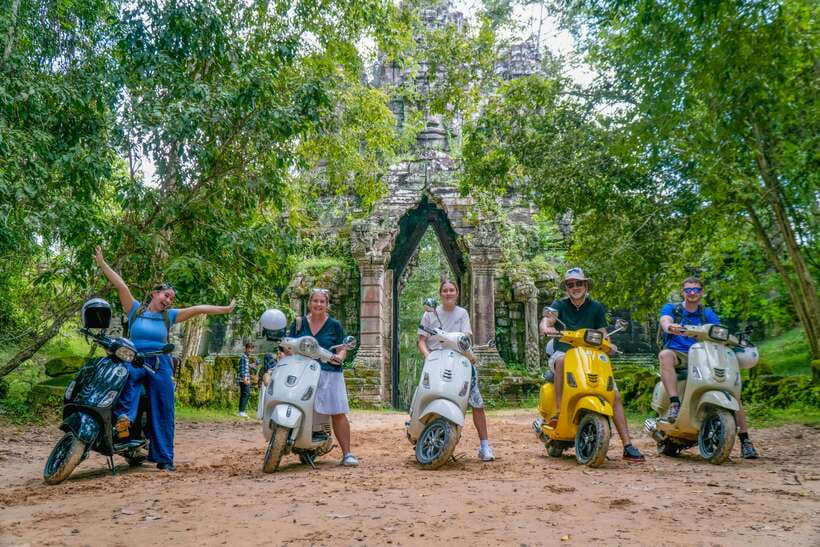 Angkor Wat: Guided Vespa Tour / Tuk Tuk or Car - Starting at Bayon among the stone faces