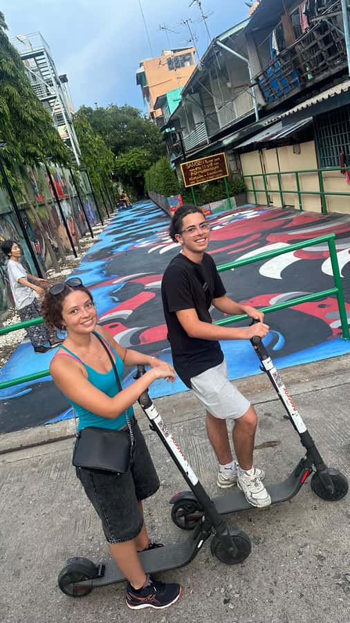 Bangkok: City Highlights Electric Scooter Tour - Family trips, couples, friends, and solo riders