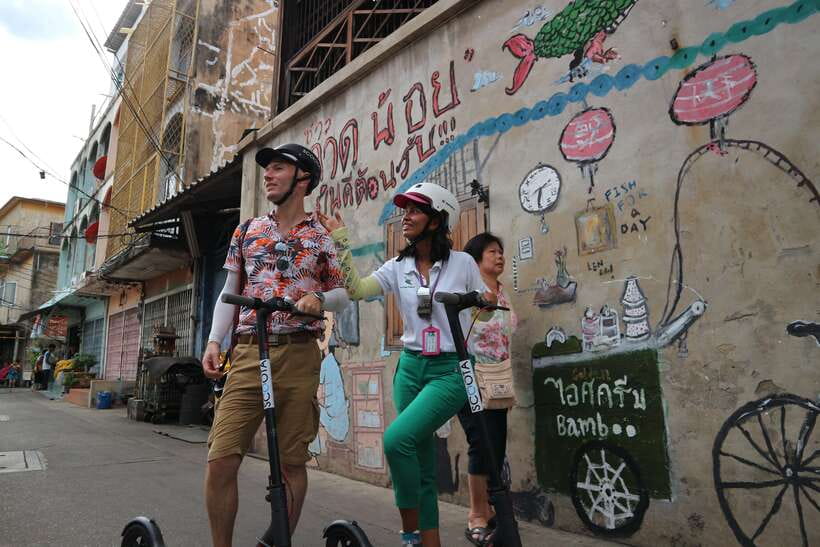 Bangkok: Riverside E-Scooter Adventure with StreetFood Snack - Talat Noi and the Chao Phraya ferry