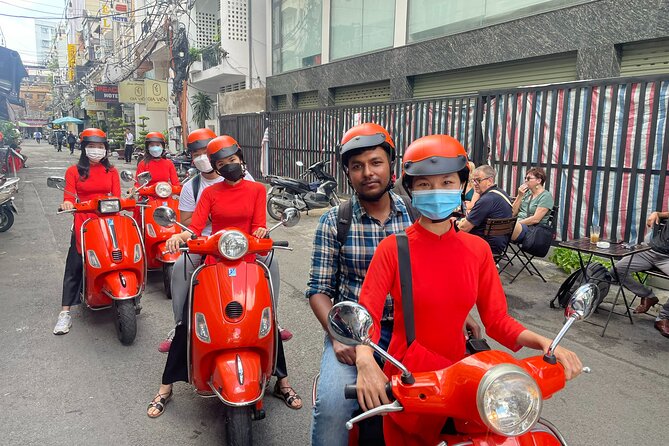 Beautiful Female Riders Vespa Red River Countryside Tour 5 Hours - Riding through rice paddies toward Co Loa