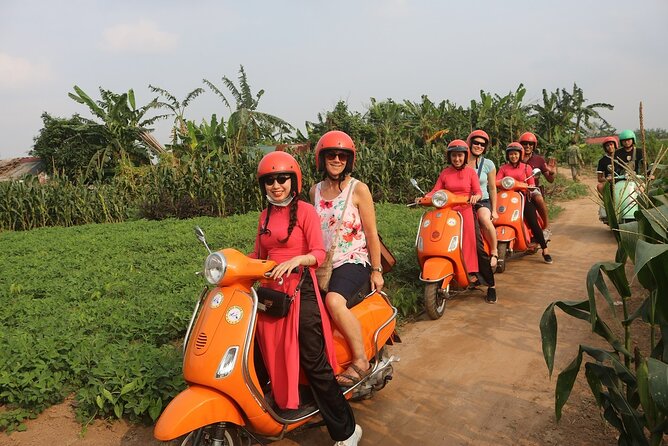 Beautiful Female Riders Vespa Red River Countryside Tour 5 Hours - The female guides and the human side of the trip