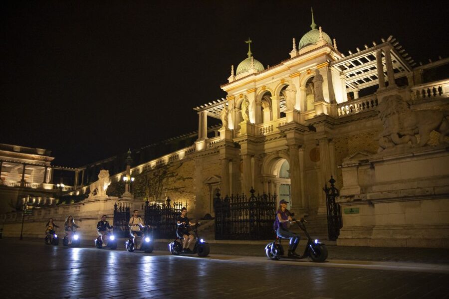 Budapest: Buda Castle E-Scooter Evening Tour - Riding from central Budapest toward Buda Castle