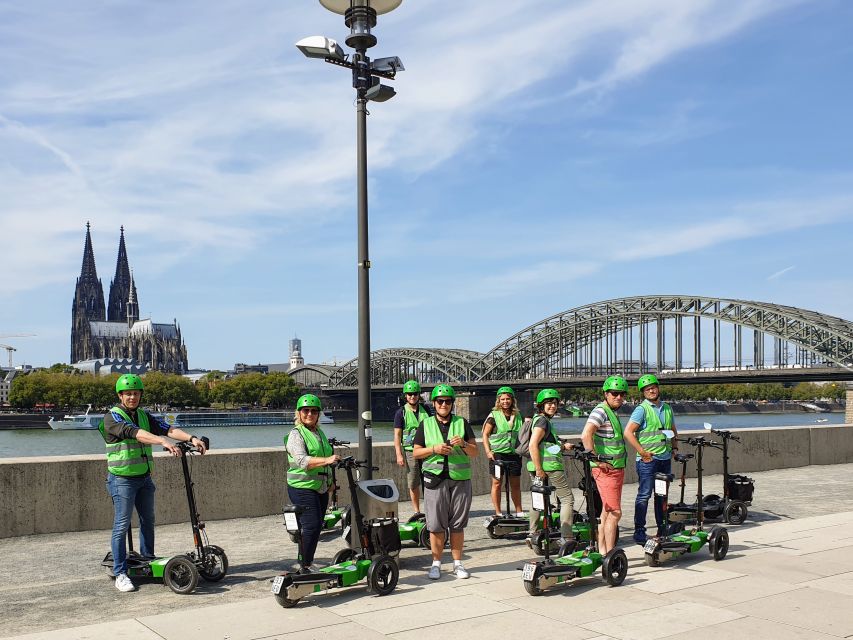 Cologne: Guided E-Scooter Tour - From the Chocolate Museum to Rheinauhafen’s crane houses