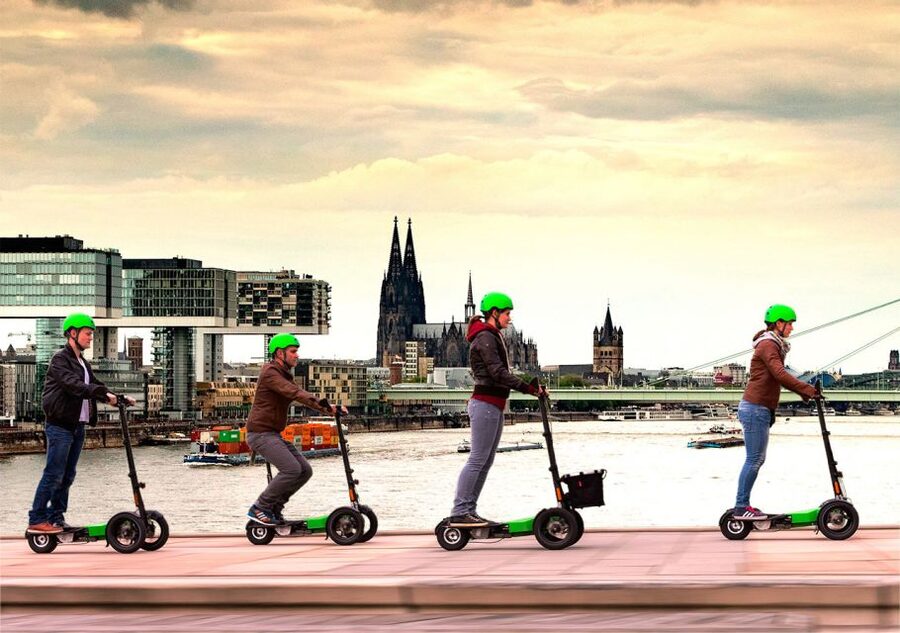 Cologne: Guided E-Scooter Tour - Starting beside the Rhine at Alter Messeturm