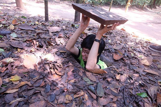 Cu Chi Tunnels By Motorbike and Scooter - A rubber tree farm and rural Vietnam