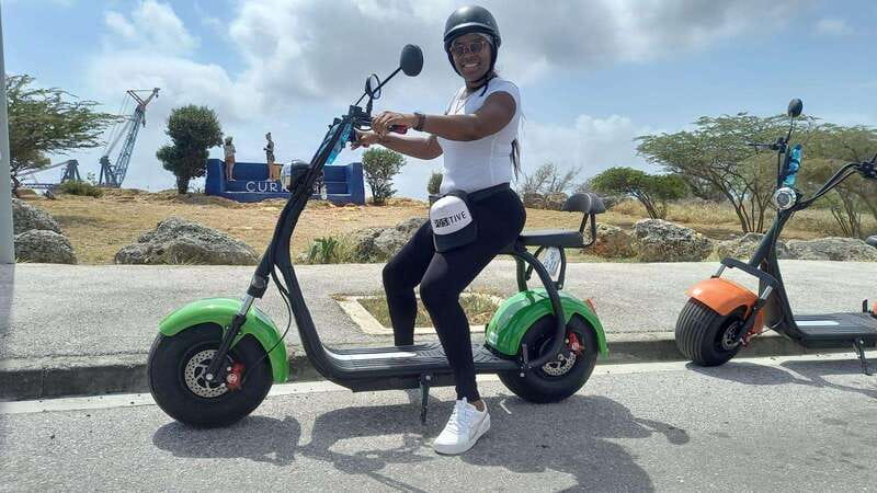 Curacao: Electric Scooter South-East Tour Adventure - Along Caracasbaai Beach, with local life around you
