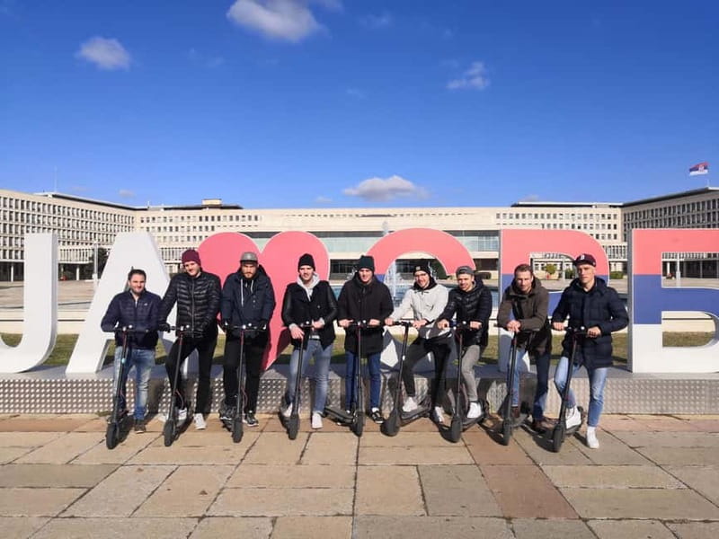 E Scooter Communist tour New Belgrade - Reading New Belgrade’s Brutalist architecture