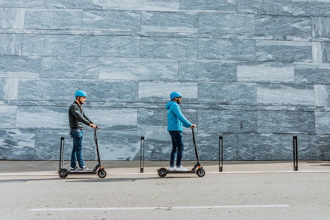 Electric Kick scooter Rental in Nice - Helmet, lock, and riding comfort