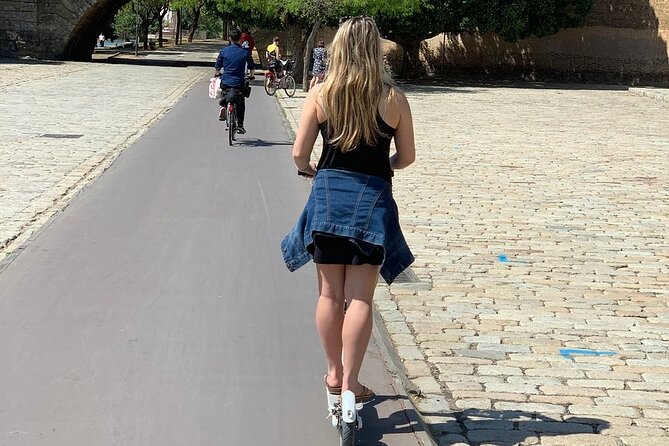 Electric Scooter Rental Seville - Crossing into Triana
