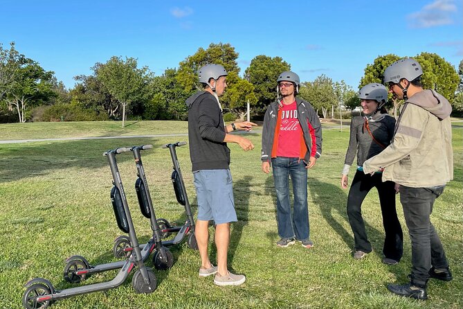Electric Scooter Waterfront Tour with Pictures - Cruising through the parks toward downtown
