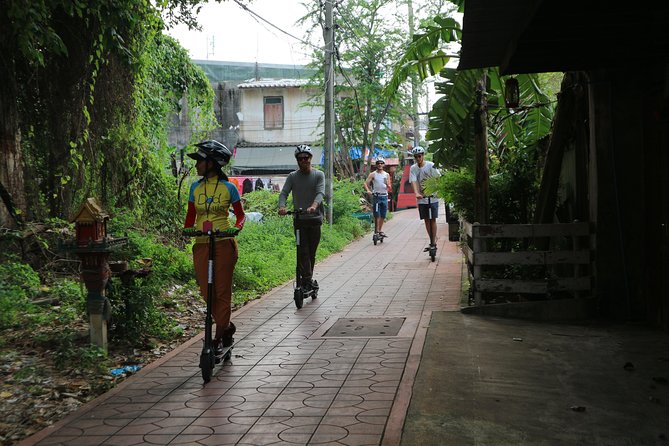 Explore Bangkok by E-Scooter & Try Street Food - Tha Din Daeng Market and pork satay
