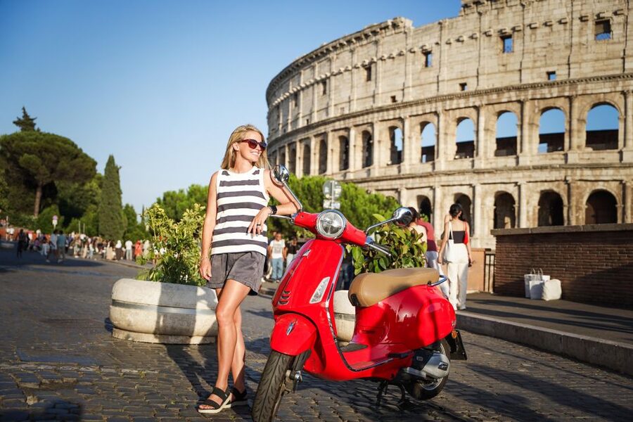 Explore city on Vespa with Professional Photographer - What you receive for $45