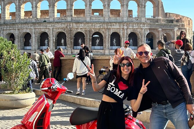 Explore Rome By Vespa - Passing the Colosseum without entering