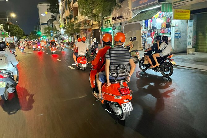 Female Riders Vespa Night Street Food + Train Street food 4 Hours - Ba Dinh Square and the big lake ride