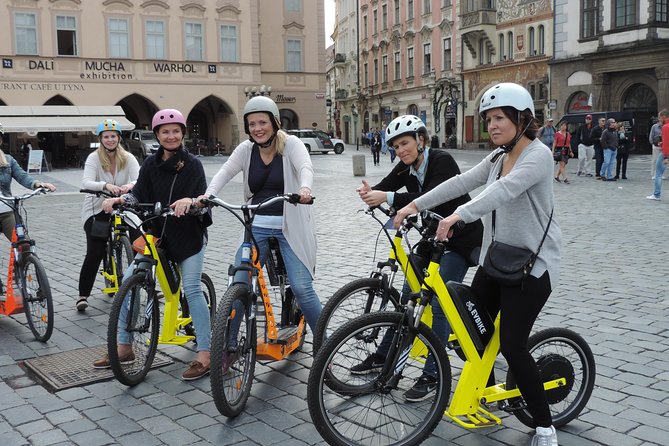 Grand City Tour of Prague on Cruiser e-Bikes or e-Scooters - What Nick and Nikita’s guiding style adds