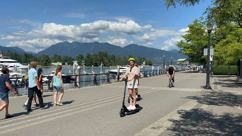 Great Vancouver EUC & E-scooters loop tour - Convention Center and Coal Harbour views