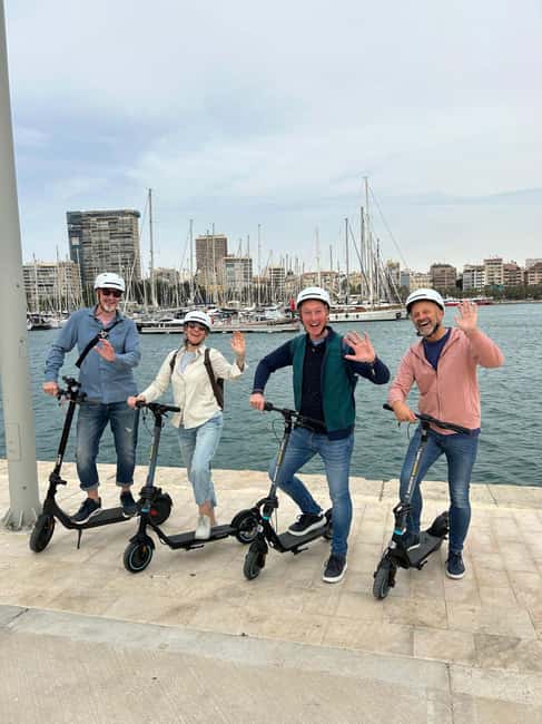 Guided Tour on an Electric Scooter / Step - Starting at Carrer Castaños and the Central Market
