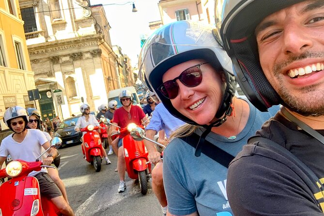 Guided Vespa Tour of Rome – Ride a Vespa with a Local Guide - Fontana dellAcqua Paola and the red Vespa photo