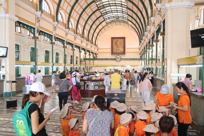 Half-Day Private Scooter Tour Including Light Meal - District 1: grand buildings and difficult history