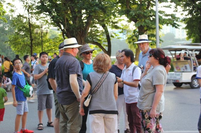 Hanoi City Street Food Night Tour by Motorscooter - Street barbecue with Hanoi families