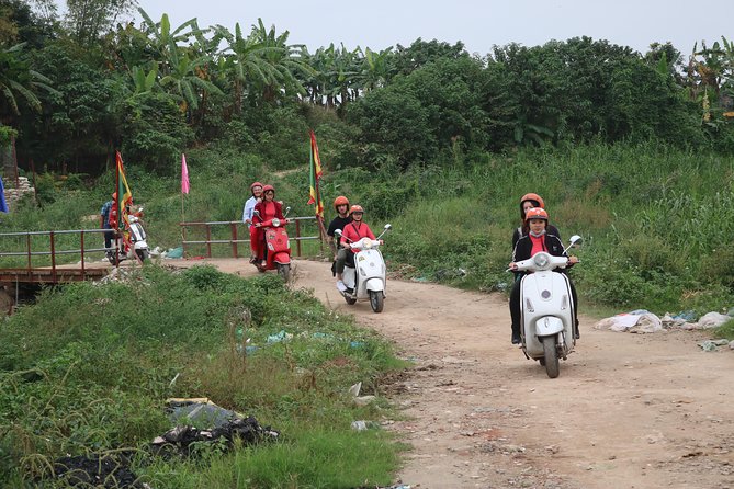 Hanoi Vespa Countryside Tour With Female Ao Dai Riders Half Day - Temples, pagodas, and the 257 BC connection