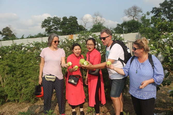 Hanoi Vespa Full Day City & Countryside with Female Ao Dai Riders - West Lake, narrow lanes, and the B52 crash site