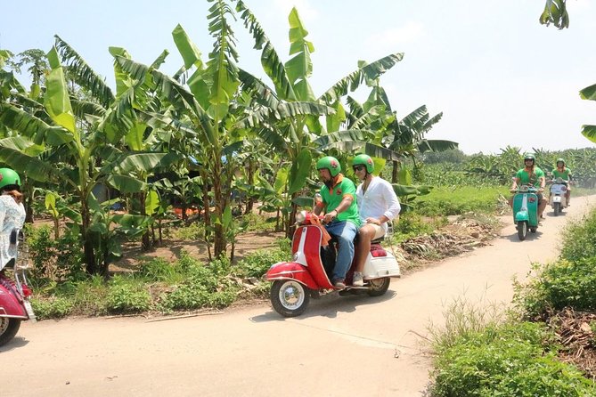 Hanoi Vespa Tour Explore Red River Delta & Rural Villages 5 Hours - Long Bien Bridge and Hanoi’s changing edge