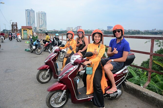Hanoi Vespa Tours Led By Women: Hanoi City Vespa Tours - Huu Tiep Lake and the downed B-52