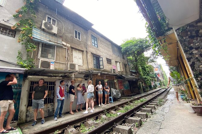 Hanoi Vintage Vespa Tours: HISTORY +FOOD + CULTURE + SIGHT + FUN - Riding through Dong Xuan and toward Long Bien Bridge