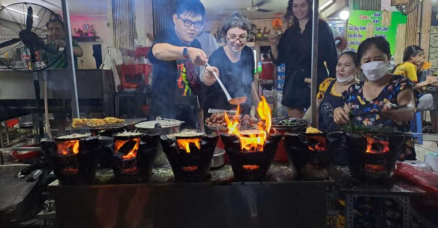 Ho Chi Minh City: Food Tour by Scooter with Eleven Tastings - Making bánh xèo at the cooking stop