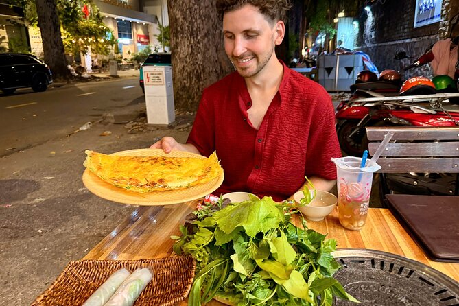 Ho Chi Minh City: Local Food Tour by Scooter with Vegan Option - Banh xeo with leaves and fresh herbs