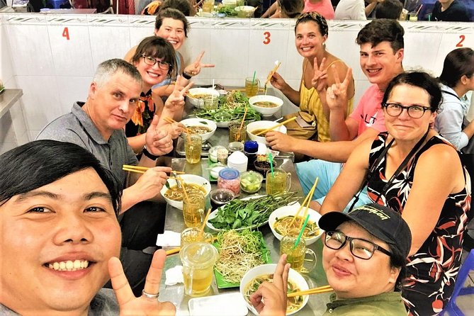 Ho Chi Minh city Street Food by scooter tour | female driver - Street food first: from baguettes to sugarcane juice