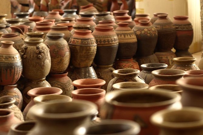 Mix Bat Trang Ceramic Village And Real Hanoi Scooter Tour - Visiting a large Hanoi pagoda