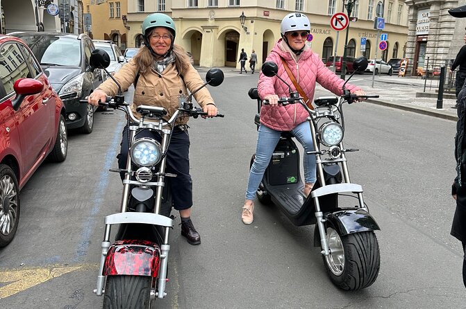 Prague E-Scooter Adventure: Fun & Easy Sightseeing 3Hours Tour - Old Town Square starts the history lesson