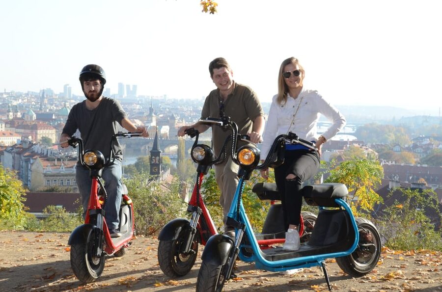 Prague Electric Scooter and eBike Grand Tour - Charles Bridge and the National Theater