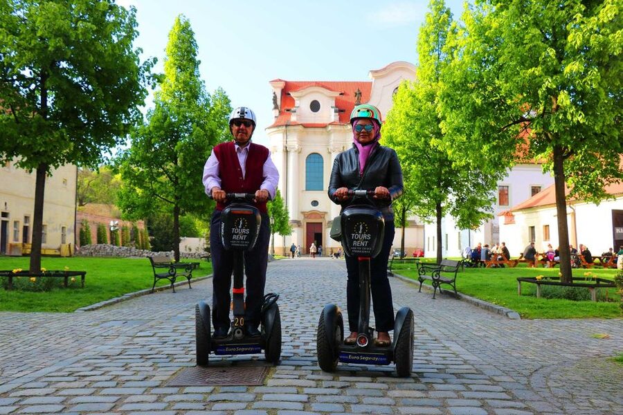 Prague: Grand Segway and eScooter Live Guided City Tour - Embassies, old village lanes, and modern design