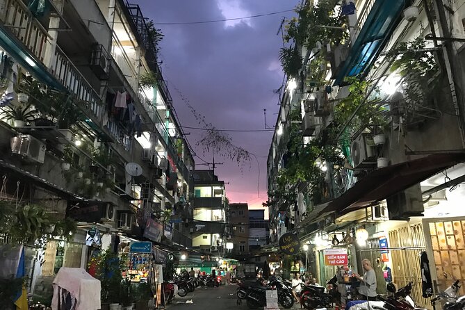 Private Craft Beer and Sightseeing Adventure Tour on Scooter in Ho Chi Minh City - Nguyen Thien Thuat apartment buildings and everyday life