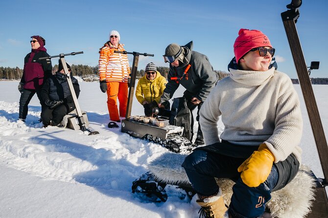 Private Driving Snow Scooters Experience in Finland - A hot drink stop in the snow