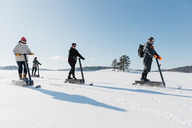 Private Driving Snow Scooters Experience in Finland - Learning the scooter before the forest