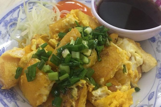 Private Saigon Night Food Tour by Scooter - Stop one: Bot Chien and the first taste of Saigon