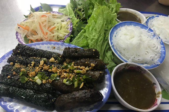 Private Saigon Night Food Tour by Scooter - Stop six: Nguyen Thien Thuat apartment buildings