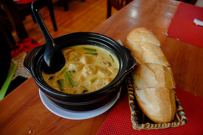 Private Vegan Food Tour By Scooter in Ho Chi Minh City - Districts 5 and 4, with the Saigon River at night