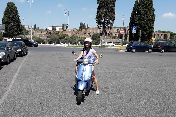 Rome Highlights by Vespa Private guided Tour - An old district, local food, and Caesar’s ruins