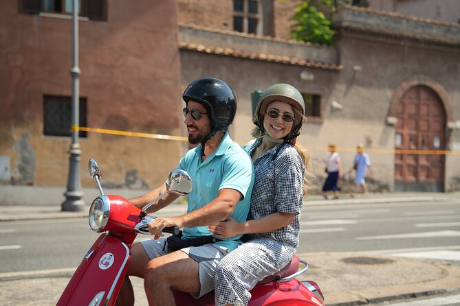 Rome’s Highest Hills Skyline Vespa Tour with Driver and Photo - The Colosseum and Rome’s ancient backdrop