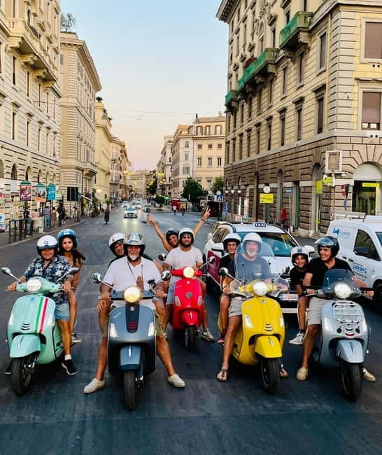 Rome’s Must-See Spots on Vespa (No Driving Needed) - The Colosseum from the passenger seat