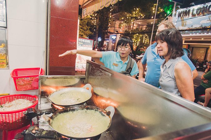 Saigon After Dark Night Tour by Scooter + 7 tastings - Chinatown, local markets, and the city’s changing face