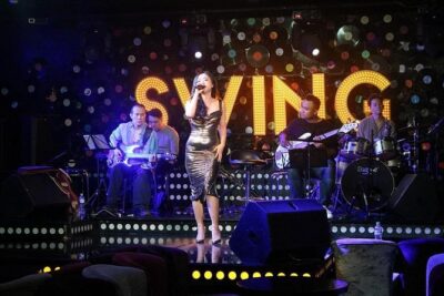 Saigon After Dark Vespa Street Food Tour + Live Music 4 hours